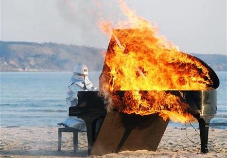 Yosuke Yamashita plays burning piano -- 